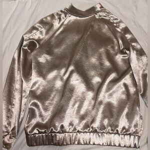 Ro&de lightly used jacket size large shimmery gold color.